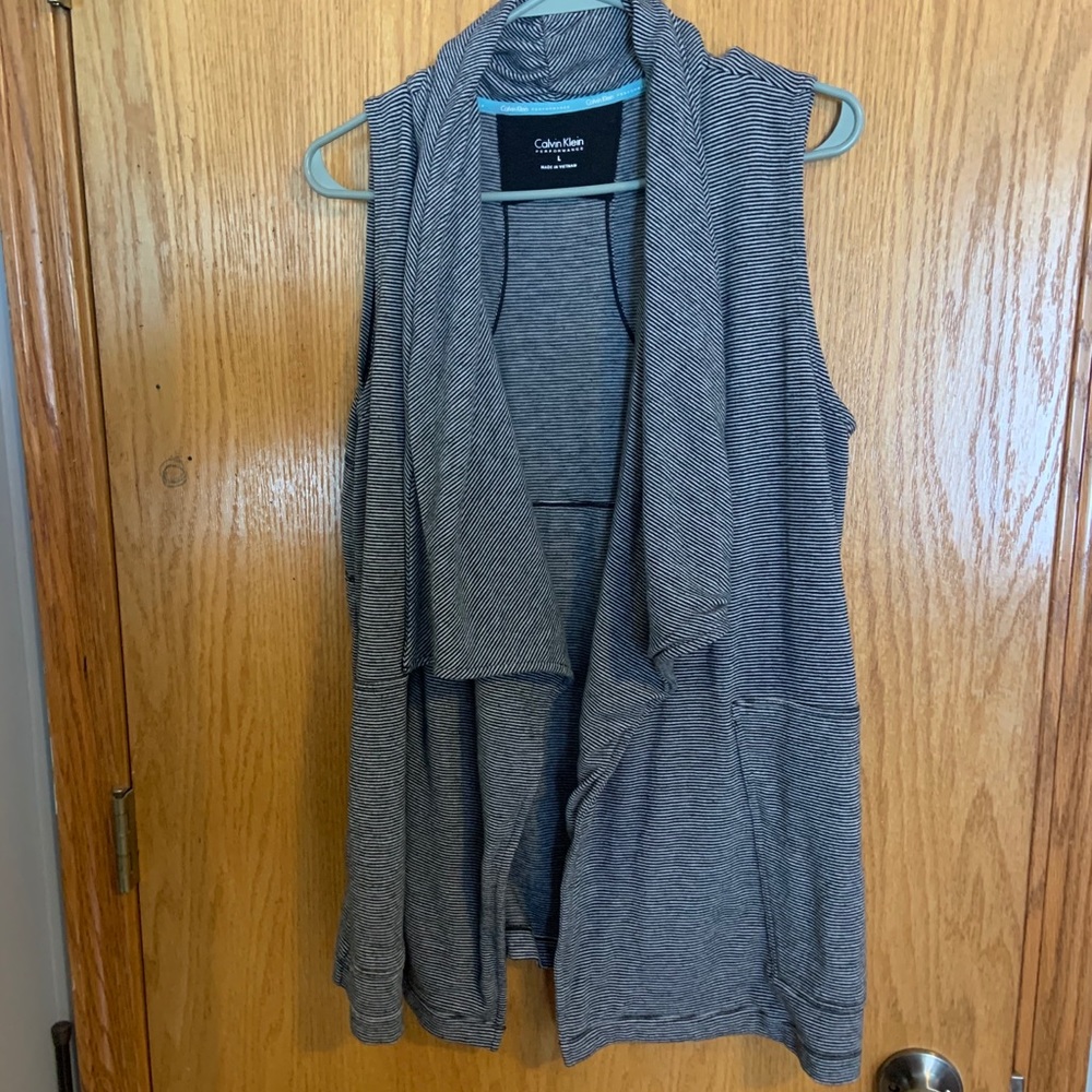 Calvin Klein performance vest. Black striped Large